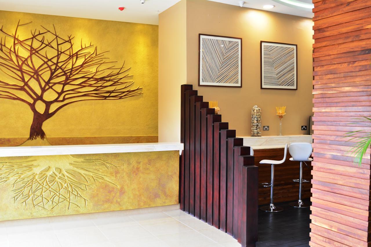 Best Western Premier Garden Hotel Энтеббе Экстерьер фото