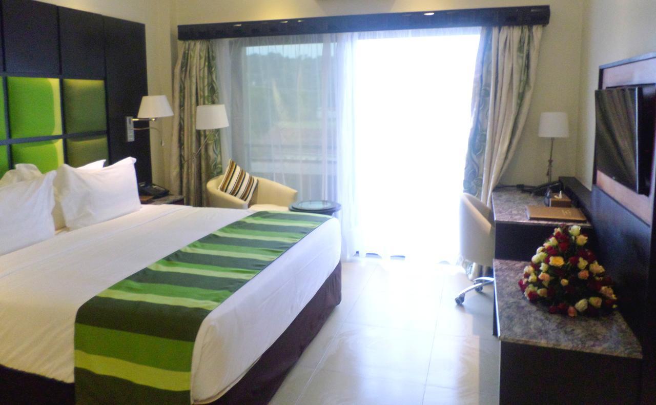 Best Western Premier Garden Hotel Энтеббе Экстерьер фото