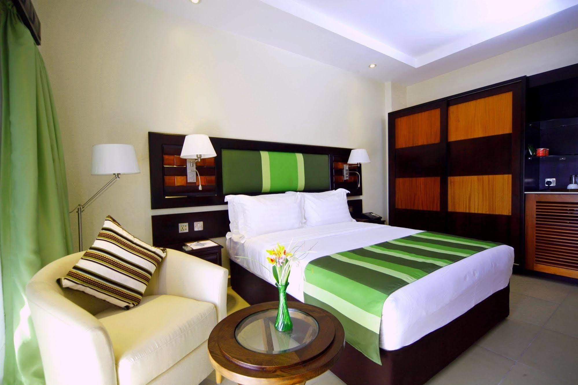 Best Western Premier Garden Hotel Энтеббе Экстерьер фото